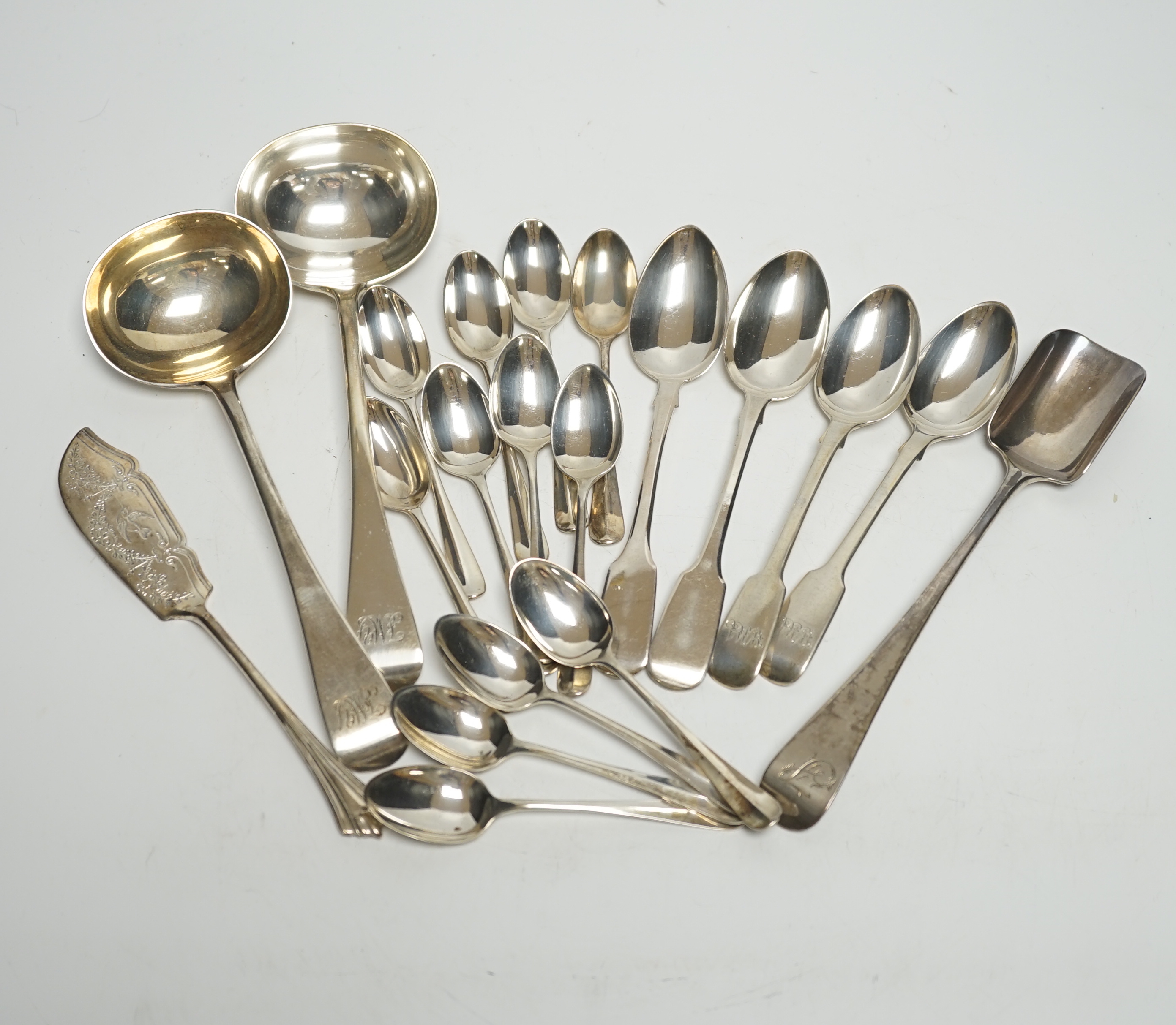 Assorted silver flatware, including teaspoons, various dates and makers, a pair of late Victorian silver Old English pattern sauce ladles, London, 1895 and a George III silver Old English pattern stilton scoop